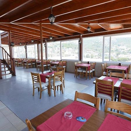 Airport Guelluek Otel Миляс Экстерьер фото