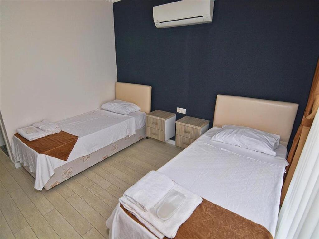 Airport Guelluek Otel Миляс Экстерьер фото