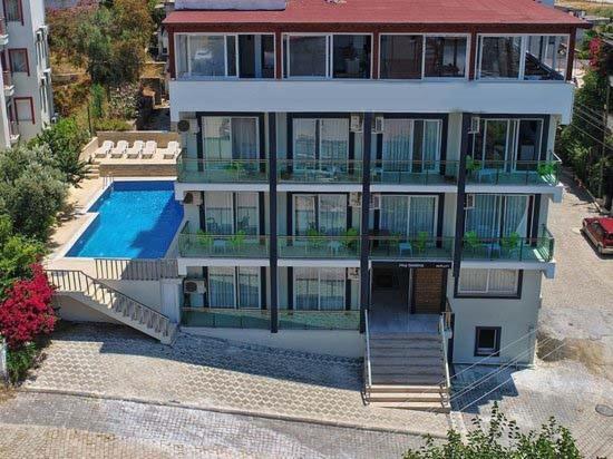 Airport Guelluek Otel Миляс Экстерьер фото